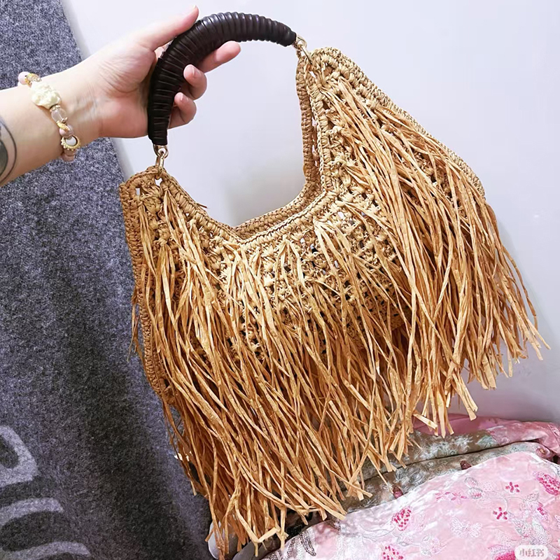 Bohemian Tassel Straw Handbag  - огляд і ціна Ethnic Fashion Designers